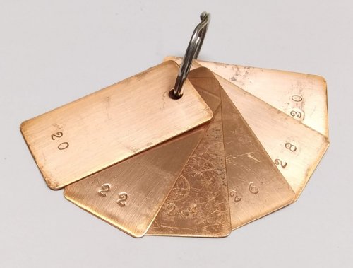 Judy Larson's Disc Cutter Basics and How to Make Metal Washers - Directions:, General Education, Tools, Slide a piece of the same gauge metal between the two cutter